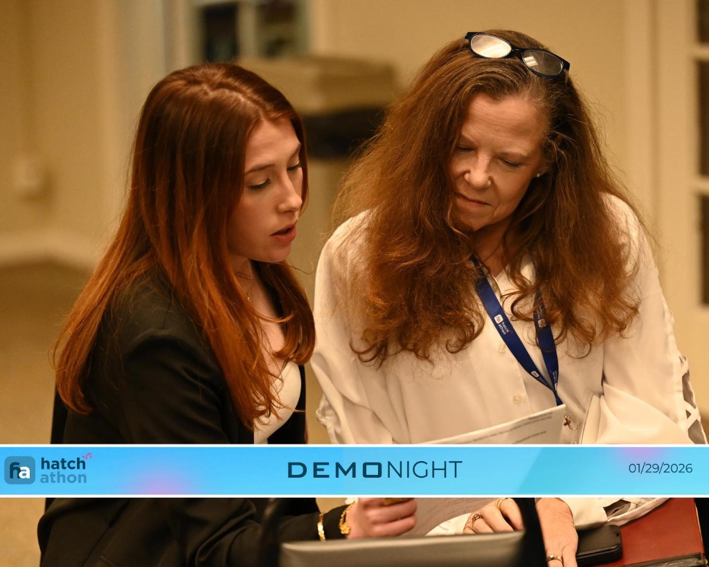 Laura Florey and collaborator at Hatchathon Demo Night on January 29, 2026