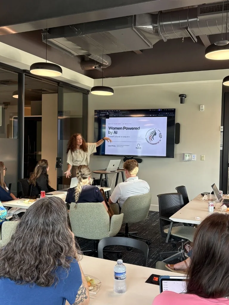 Laura teaching a practical AI session at Hatch in Fairhope