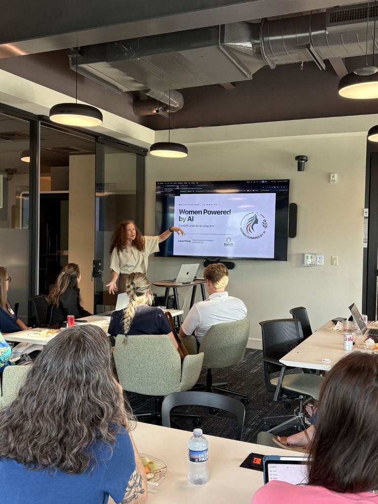 Laura Florey presenting Girls Just Wanna Prompt at Women Powered by AI at Hatch in Fairhope